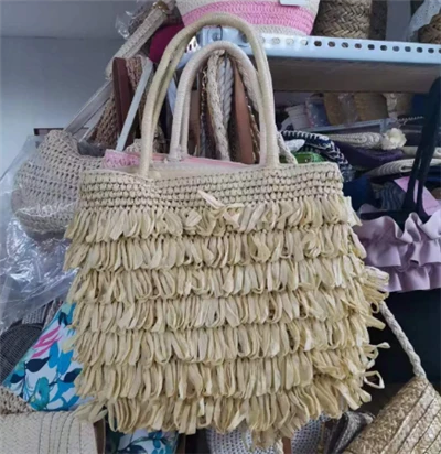 Kézi szőtt bojt bőr szalma táska